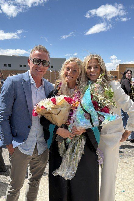 Spring, Brian and their daughter at her graduation