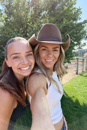 Spring and her daughter in cowboy hats